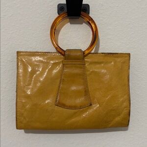 HOBO Clutch with Amber Handle